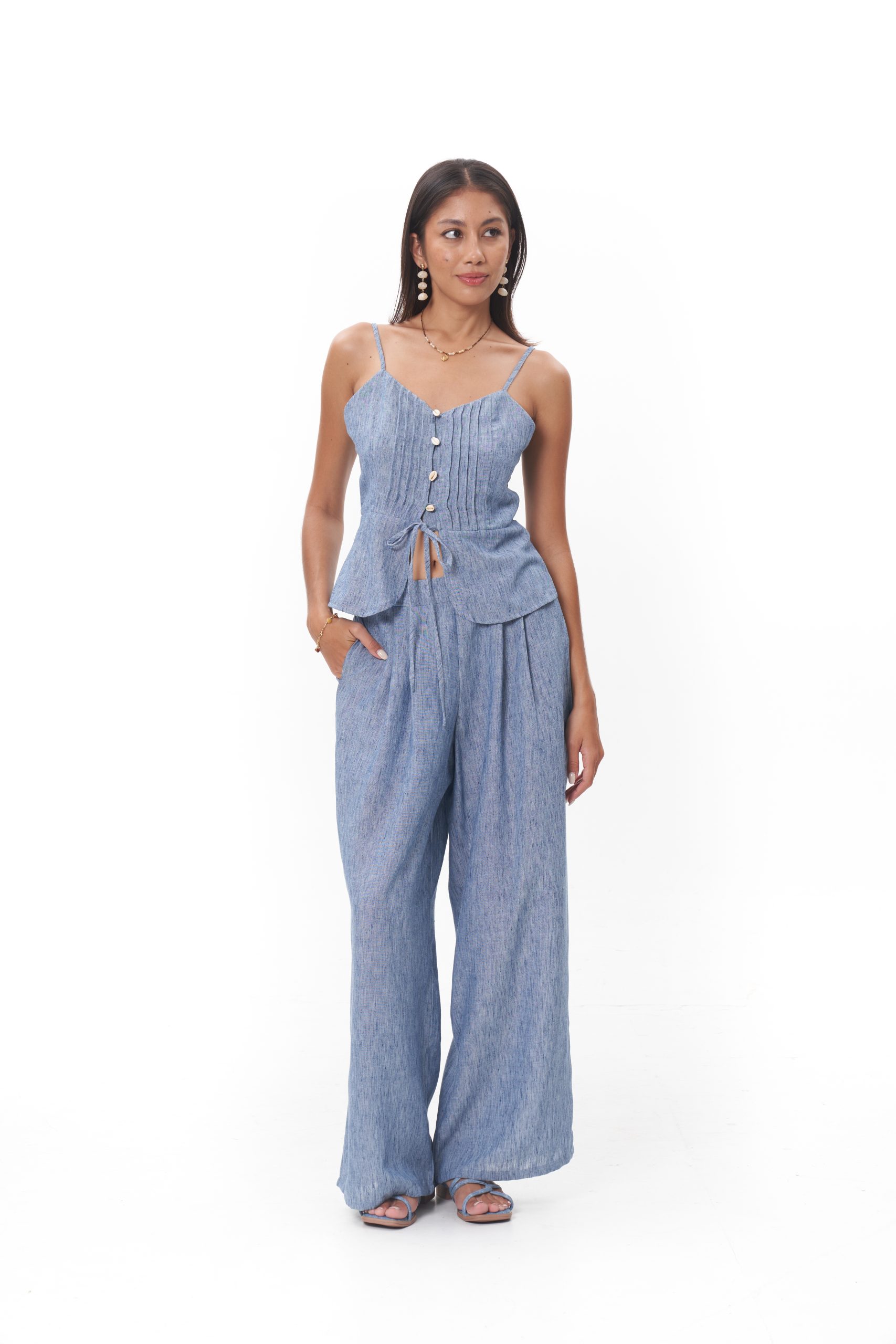 Luma Pant The Luma Pant is defined by its fluid wide-leg cut and relaxed drape. Designed to sit comfortably at the waist, it elongates the silhouette while offering all-day ease. Lightweight and breathable, it balances bohemian softness with modern polish, making it a timeless staple whether styled as a set or worn separately.