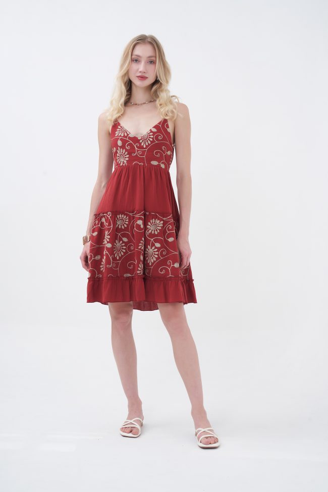 The Aurelie Mini Dress is a romantic, feminine style featuring a flattering V-neckline, delicate straps, and intricate floral embroidery across the bodice and skirt. Designed with a softly gathered waist and a flowy midi-length silhouette, it’s finished with an elegant open back and statement bow for a charming touch—perfect for warm days and special occasions.