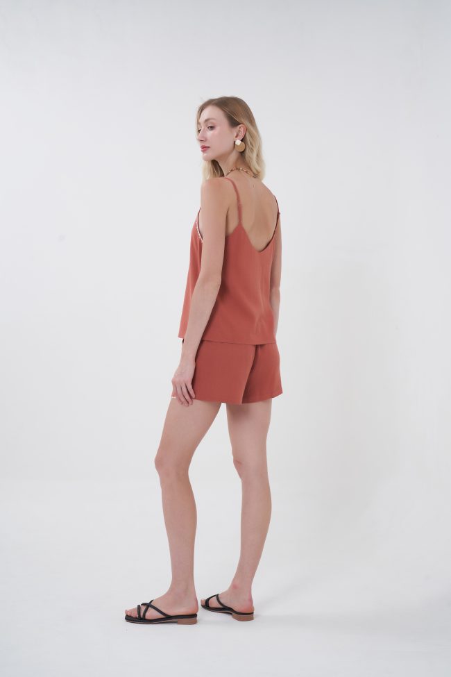 An easy, throw-on piece that still feels special, the Solea Camisole is designed with a soft, fluid drape that skims the body without clinging. The delicate contrast trim along the neckline adds just enough detail to stand out, giving it that subtle handcrafted vibe. Lightweight and breathable, it’s the kind of top you’ll reach for on repeat—effortless on its own, even better as a set.